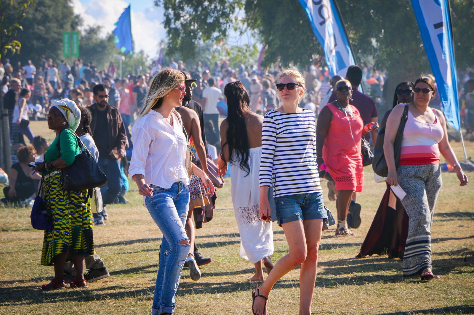 People attending a community event in a London park.